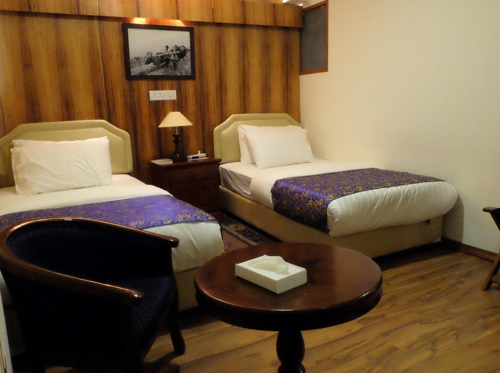 Hotel Norbuling Тхимпху Номер фото