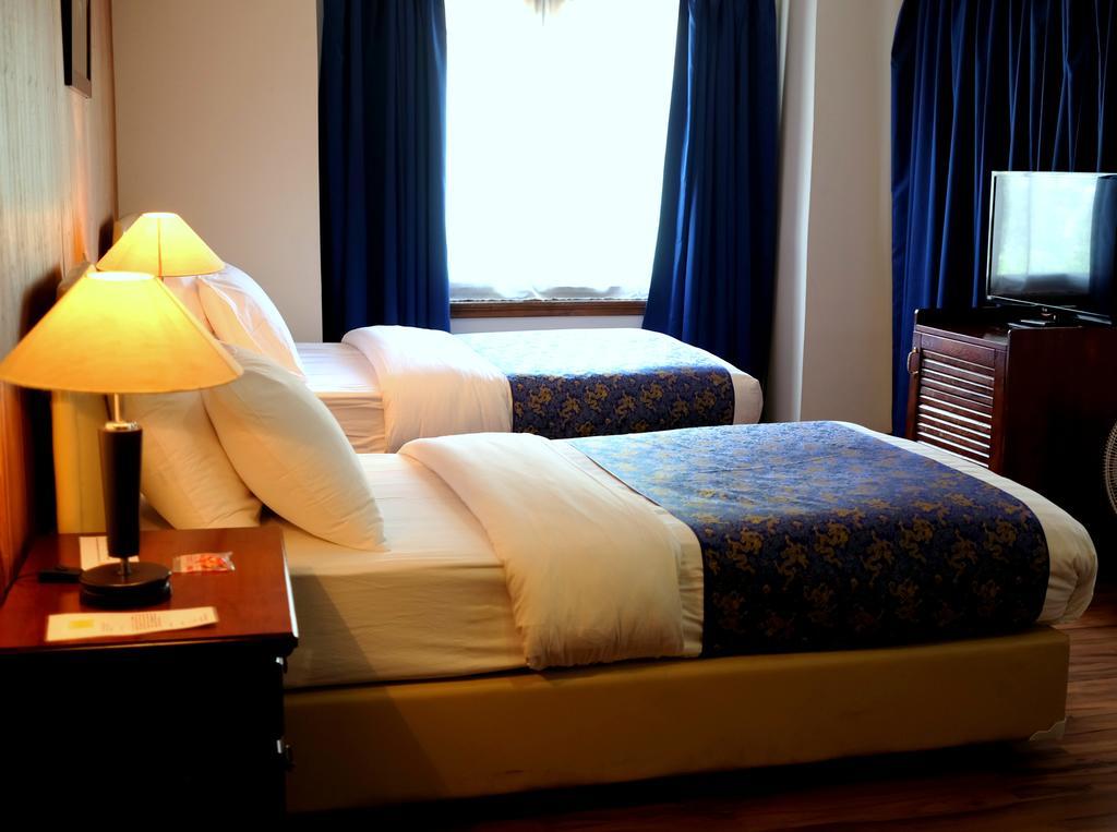 Hotel Norbuling Тхимпху Номер фото