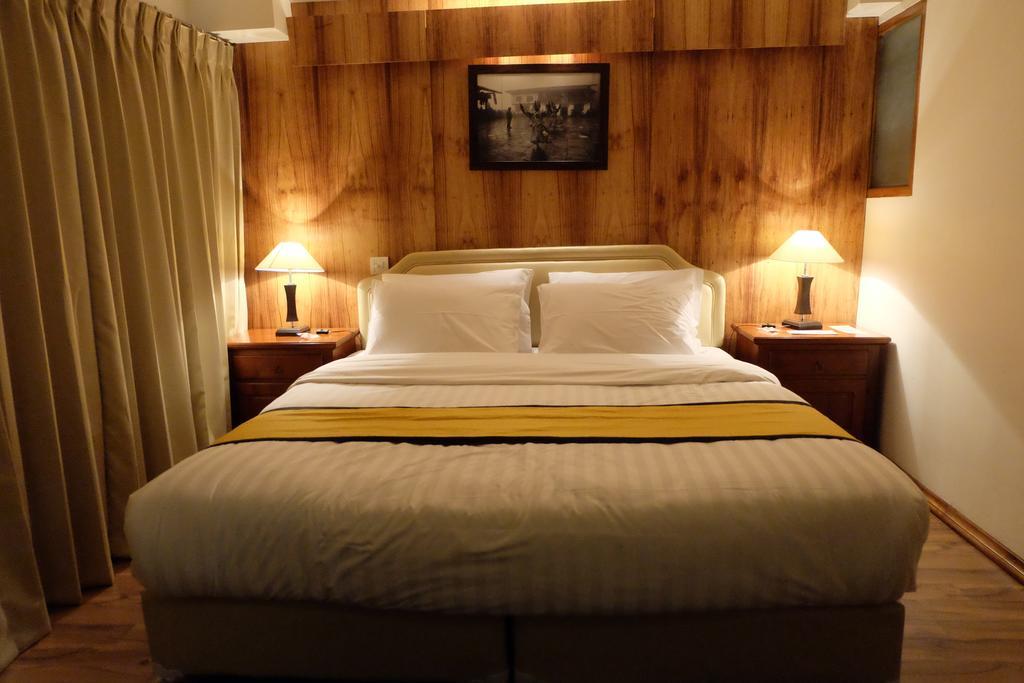 Hotel Norbuling Тхимпху Номер фото